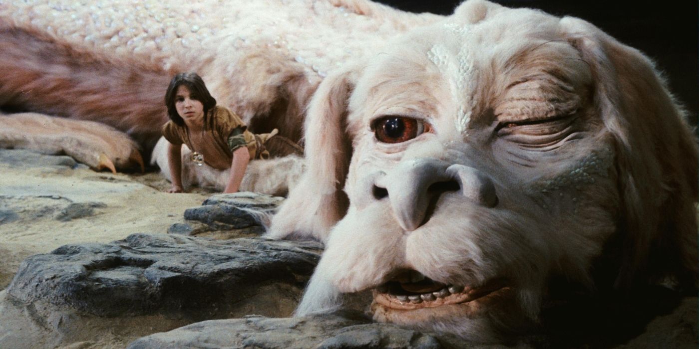 A boy next to the dragon Flakor in The NeverEnding Story