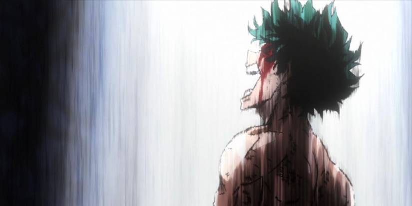 A bloodied Deku screaming in pain in My Hero Academia