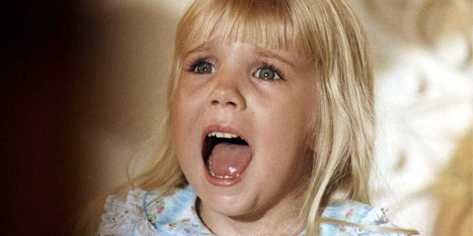 Heather O'Rourke as Carol Anne Freeling, screaming in 'Poltergeist'