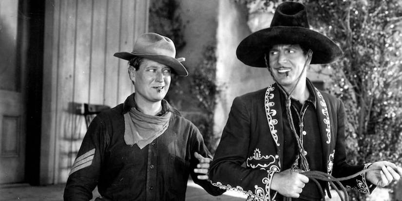 Warner Baxter sebagai The Cisco Kid dan Edmund Lowe sebagai Dunn di In Old Arizona