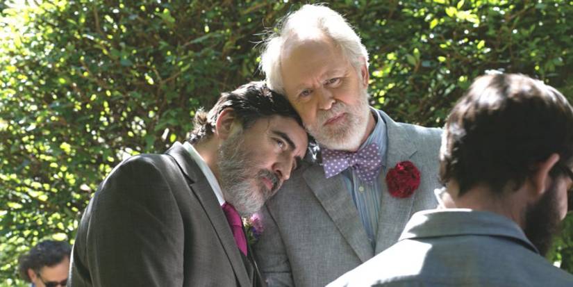 Alfred Molina as George resting his head in John Lithfow as Ben's shoulder in the film Love is Strange