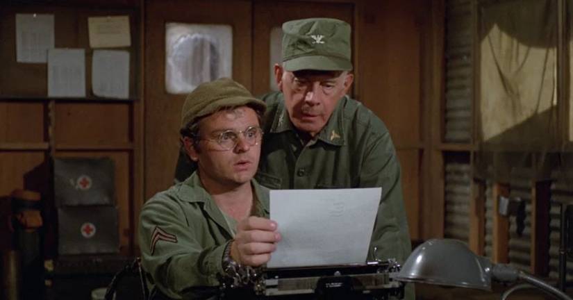 Gary Burghoff as Radar in M*A*S*H* holdig a piece of paper from a typewriter