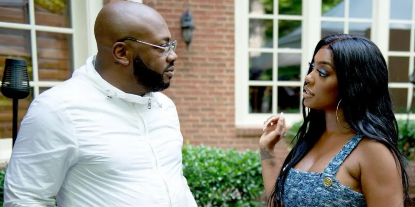 Porsha Williams and Dennis McKinley stand outside talking on 'Real Housewives of Atlanta'