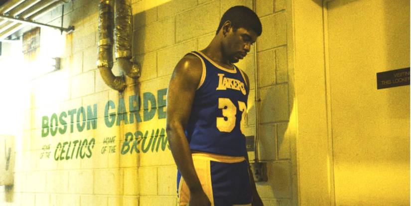 Quincy Isaiah leaning against a wall in Winning Time-1