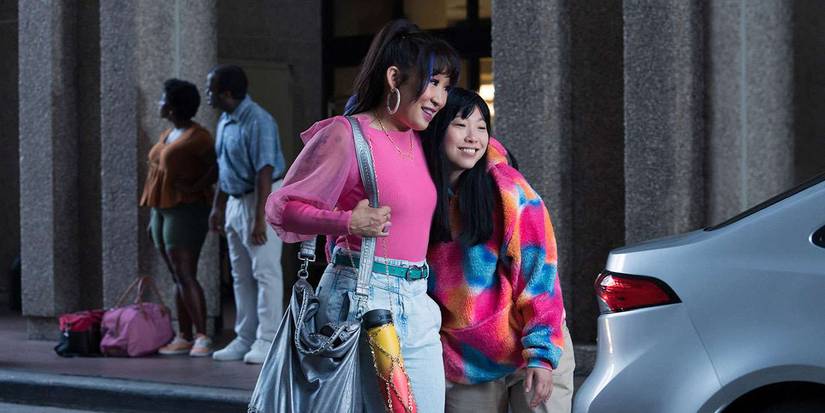 Awkwafina and Sandra Oh hugging in Quiz Lady