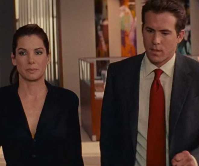 Sandra Bullock and Ryan Reynolds at work in The Proposal