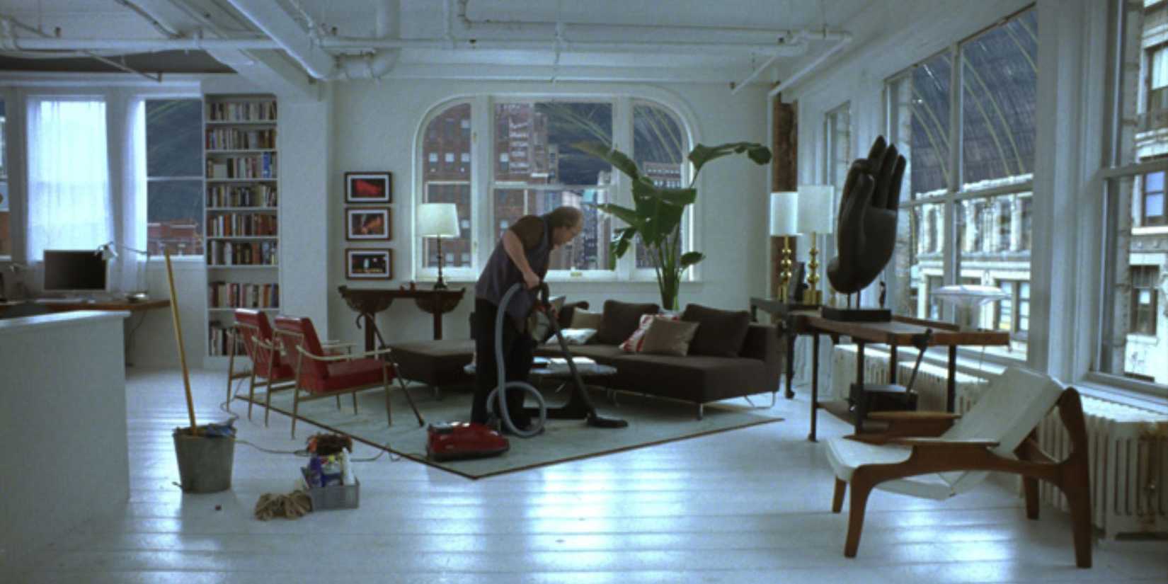 Caden Cotard vacuuming his apartment in Synechdoche, New York