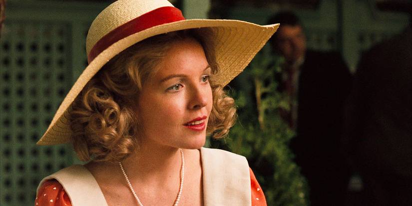 Diane Keaton as Kay Michelson with a curious expression looking at something off-camera in The Godfather.