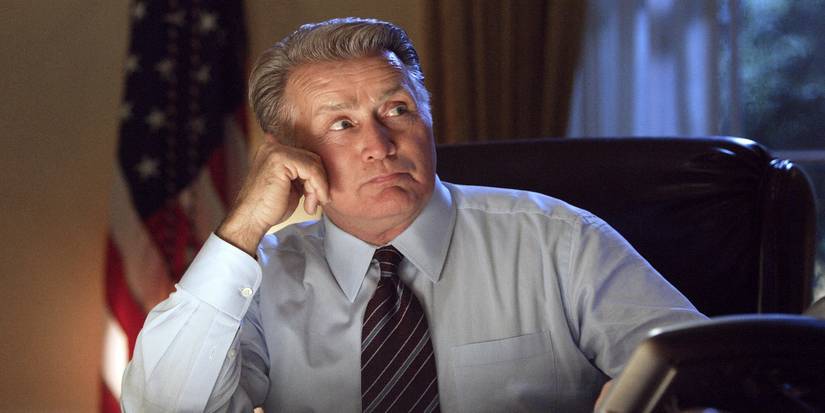 Martin Sheen as President Bartlett listening in The Oval Office in The West Wing.