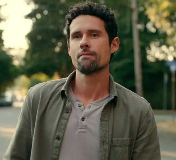 Benjamin Hollingsworth as Dan Brady in the middle of a street looking to the distance in Virgin River.