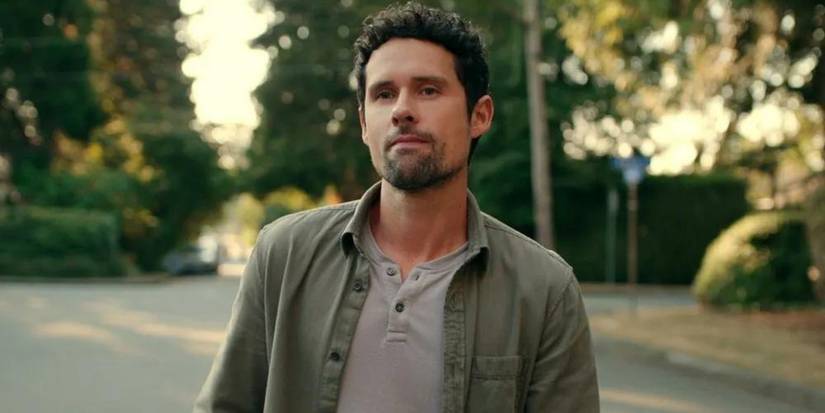 Benjamin Hollingsworth as Dan Brady in the middle of a street looking to the distance in Virgin River.