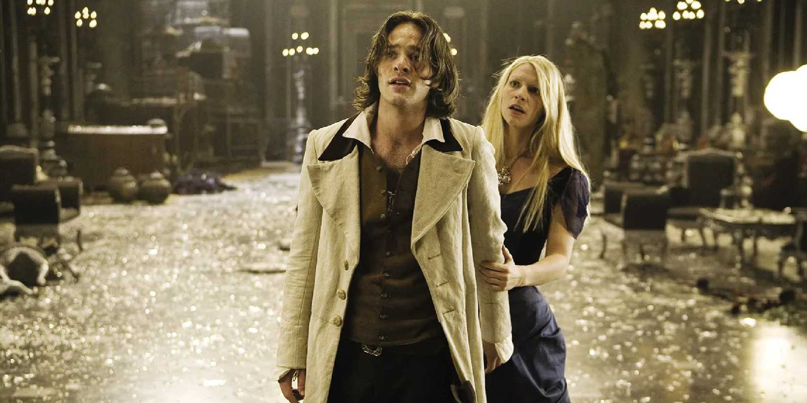 Yvaine (Claire Danes) standing behind Tristan (Charlie Cox) as they both look ahead in Stardust