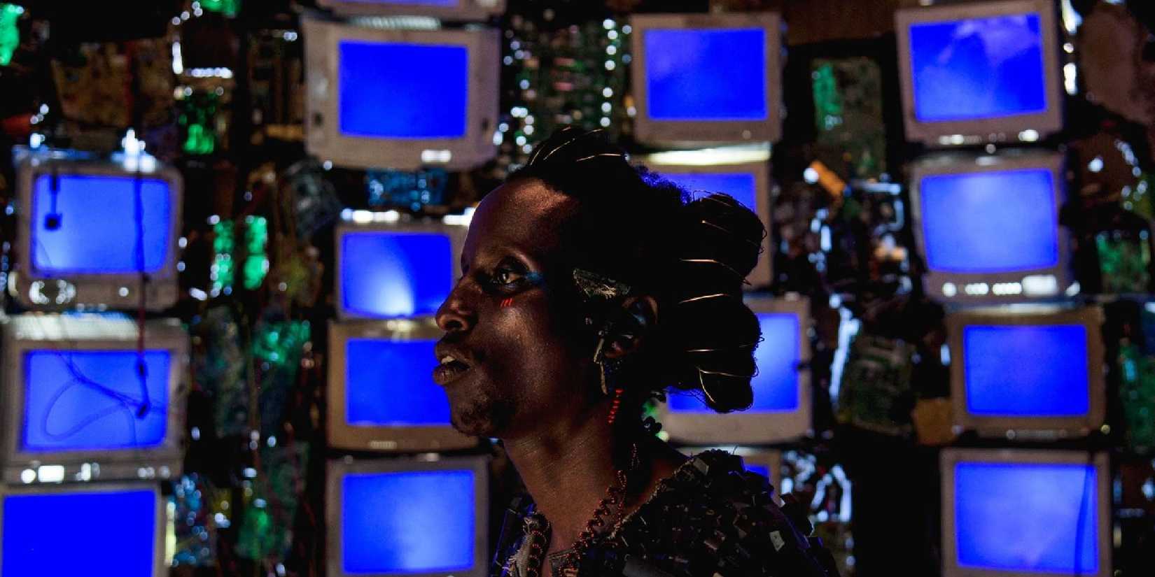 Elvis Ngabo with wires around his head in Neptune Frost.