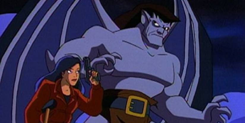 'Gargoyles' characters Goliath and Elisa standing together, voiced by Keith David and Salli Richardson respectively.