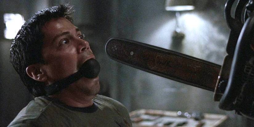 Paxton (Jay Hernandez) is gagged with a chainsaw in his face in 'Hostel'
