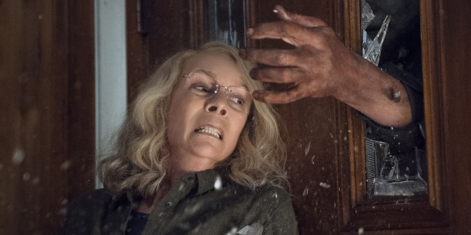 Jamie Lee Curtis being attacked in Halloween 2018
