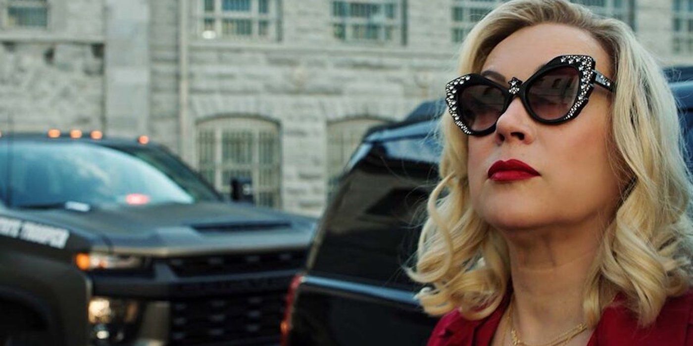 Jennifer Tilly as Tiffany Valentine wearing sunglasses and getting out of a car in Chucky Season 3
