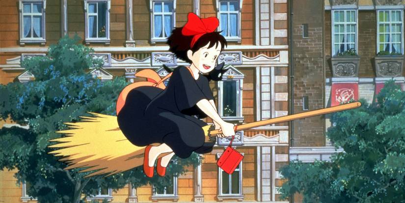 Kiki and Jiji flying on a broom past a house in 'Kiki's Delivery Service'