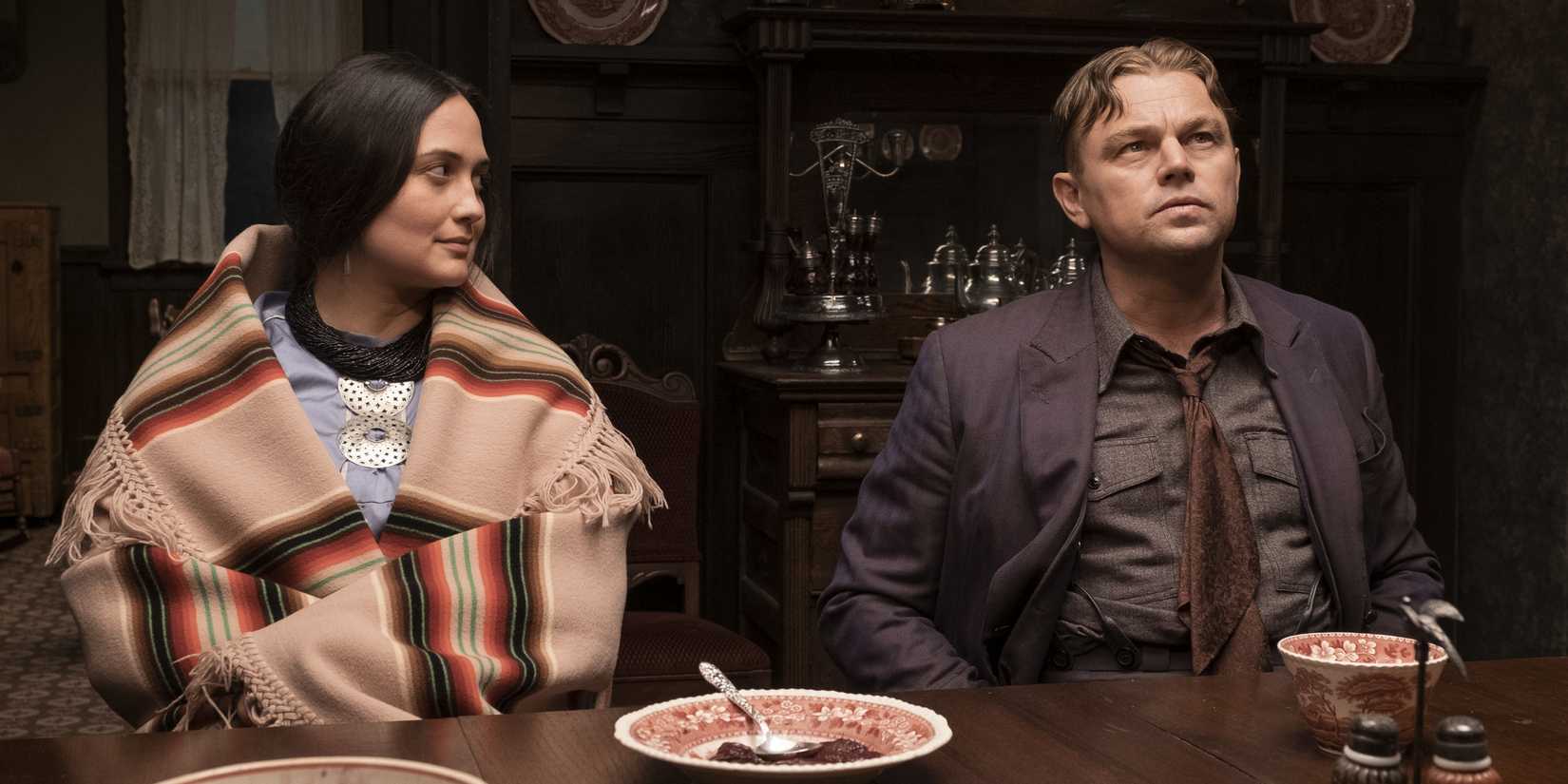 Ernest and Mollie Burkhart sitting at a dinner table in Killers of the Flower Moon