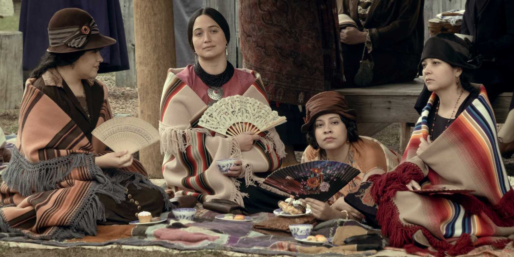 Lily Gladstone as Mollie Burkhart with other indigenous women in Killers of the Flower Moon