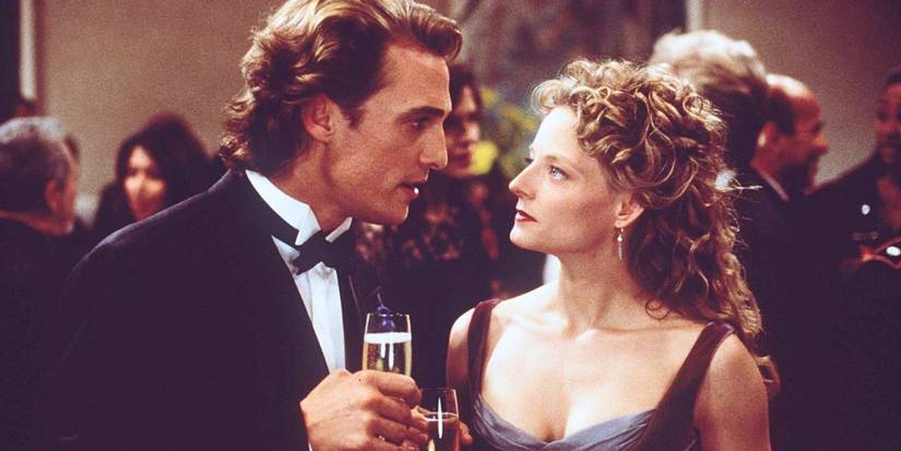 Ellie and Palmer talking at a party in Contact (1997)