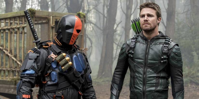 Oliver Queen standing with Deathstroke in Arrow