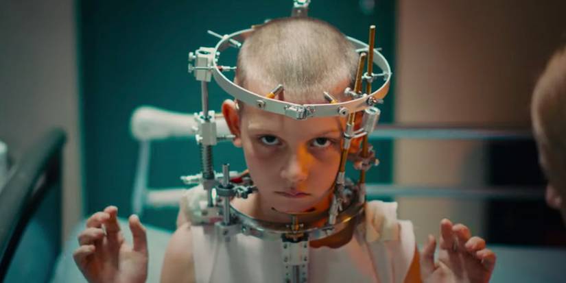 A young girl with a device around her head in 'Titane'