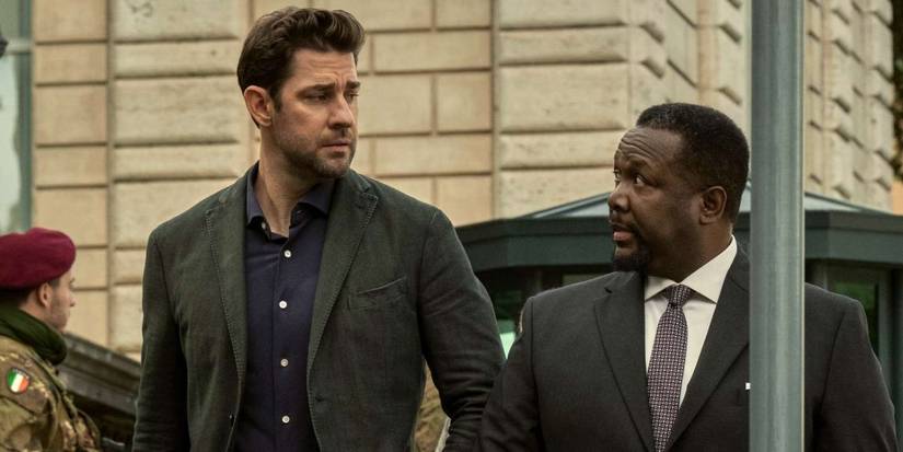John Krasinski as Jack Ryan and Wendell Pierce as James Greer walking together in 'Jack Ryan.'