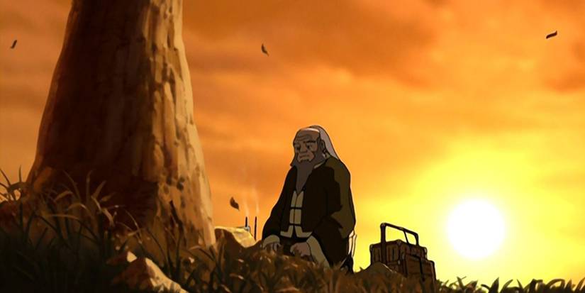 Uncle Iroh looking solemn and lighting two candles under a tree in Avatar: The Last Airbender.