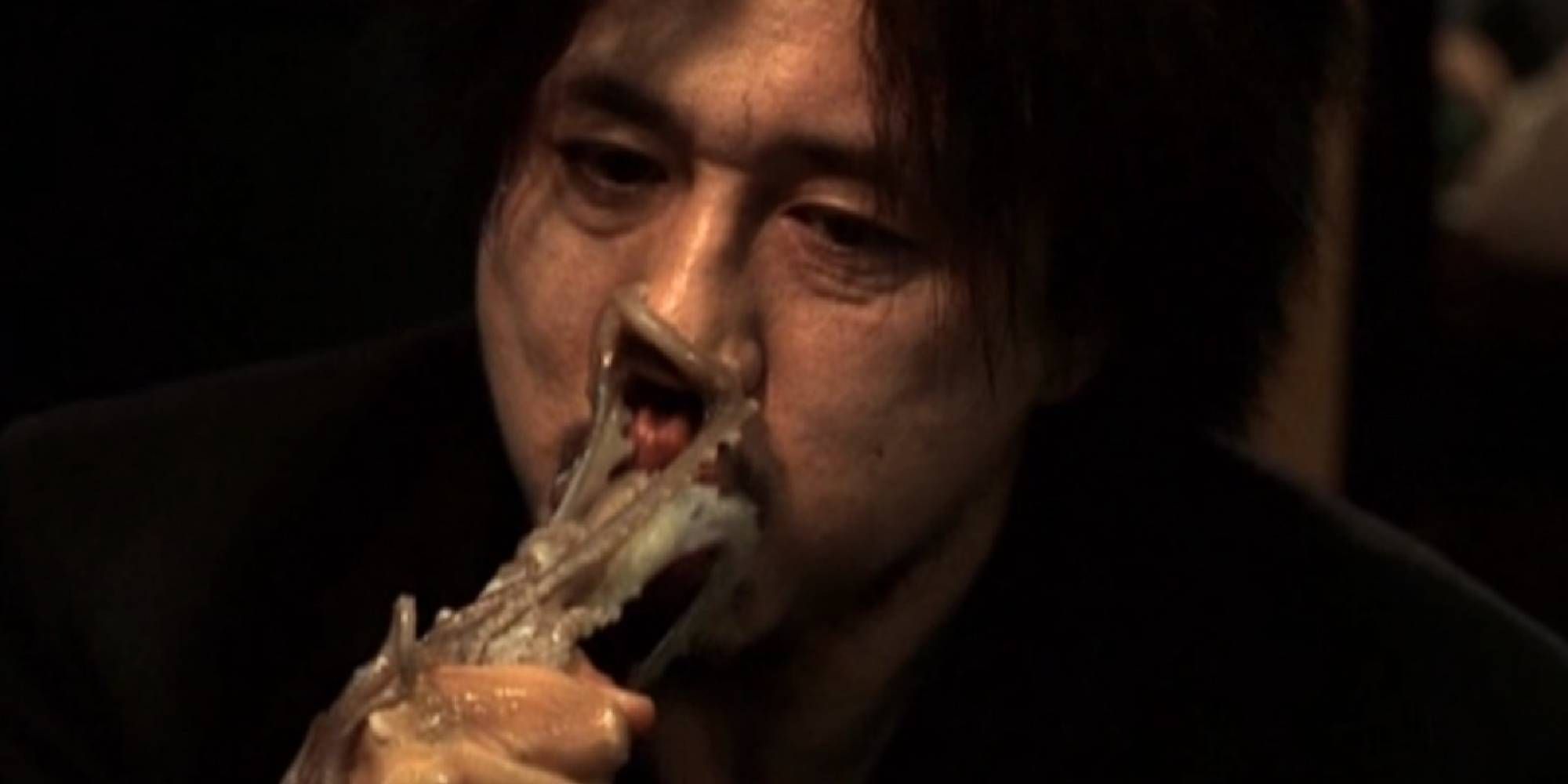 A man eating an octopus in Oldboy