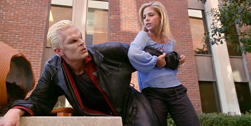 Buffy holding Spike down by the arm in Buffy the Vampire Slayer