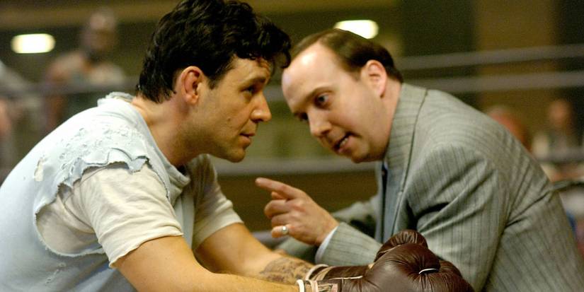 Jim Braddock and Joe Gould talking in the boxing ring in Cinderella Man