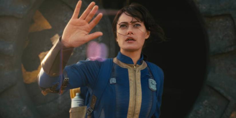 Ella Purnell as Lucy stepping out of Vault 33 in Prime Video's Fallout