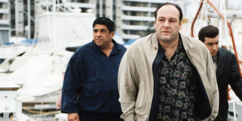 Tony Soprano walking with his associates at a port in The Sopranos