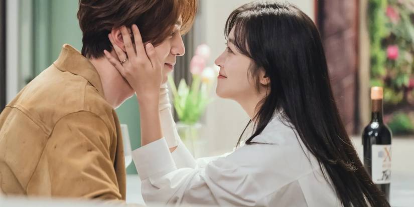 Jo Bo-ah as Nam Ji-ah cupping Lee Dong-wook as Lee Yeon's face as both smile in the K-Drama Tale of the Nine-Tailed
