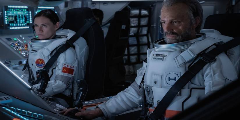 Ed Baldwin & Svetlana Zakharova in a space shuttle cockpit in For All Mankind Season 4