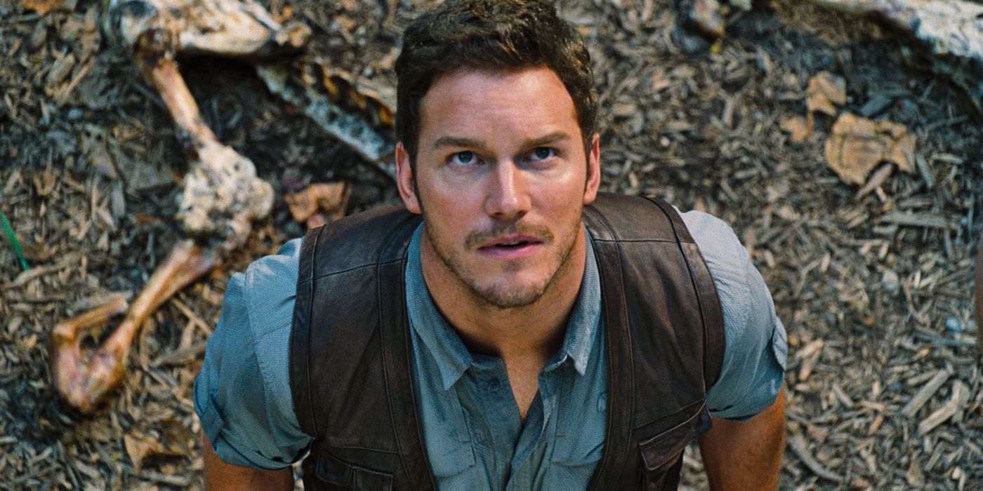 Chris Pratt looking up in a scene from Jurassic World.