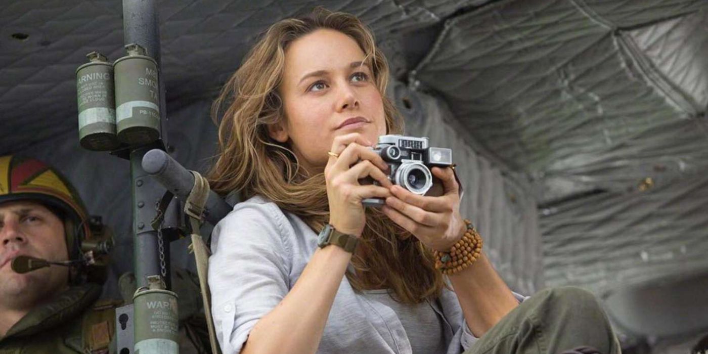 Brie Larson holding a 1970s camera in Kong: Skull Island