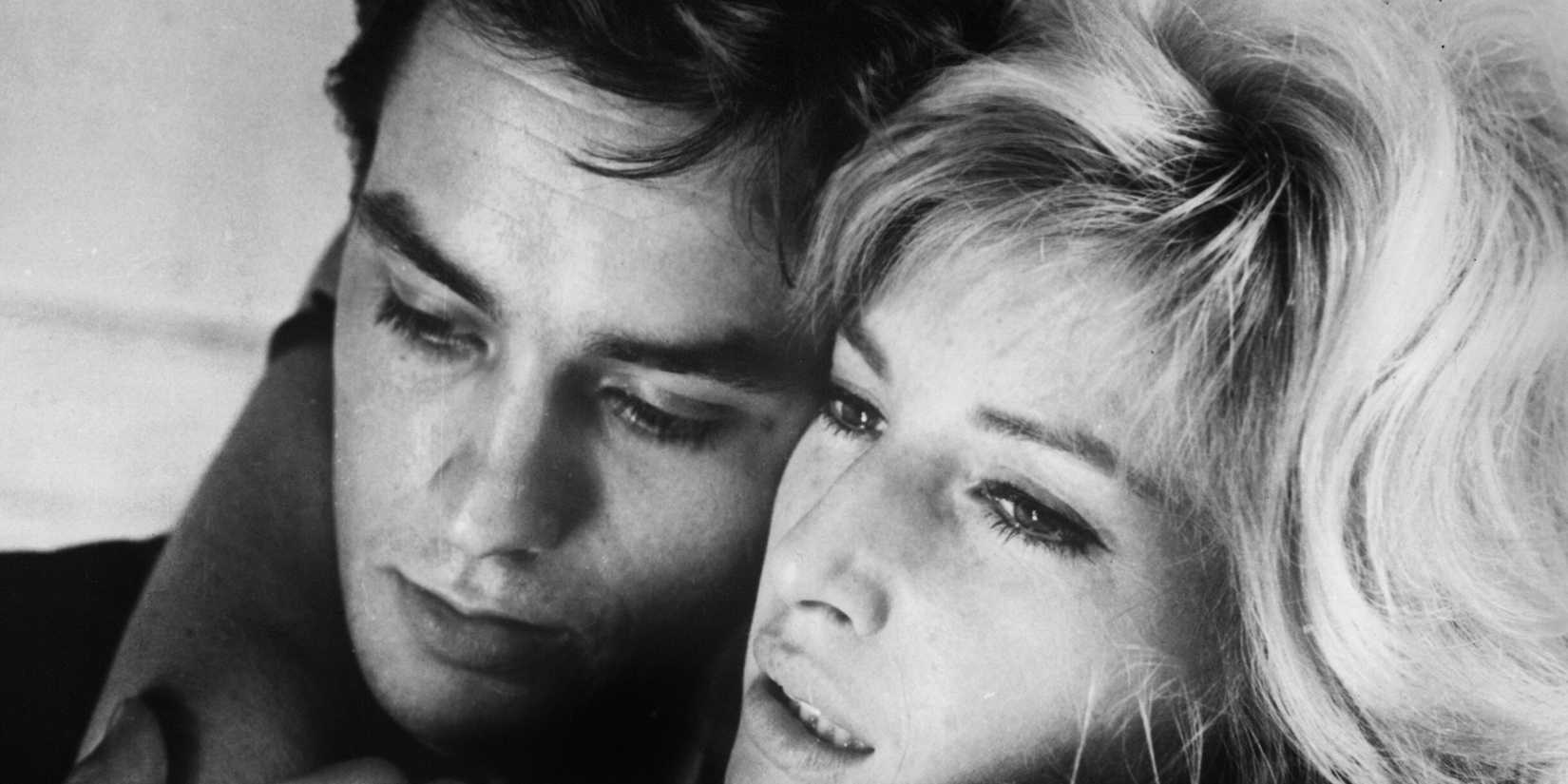 A man and a woman cheek to cheek in L'Eclisse