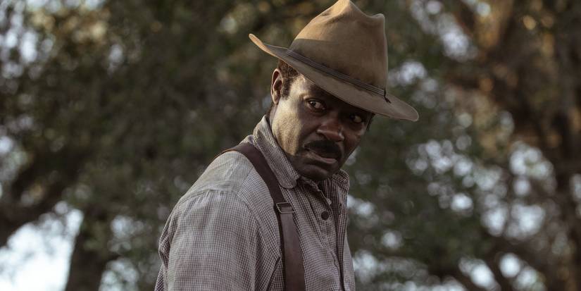 David Oyelowo looking to the side outdoors in Lawmen: Bass Reeves