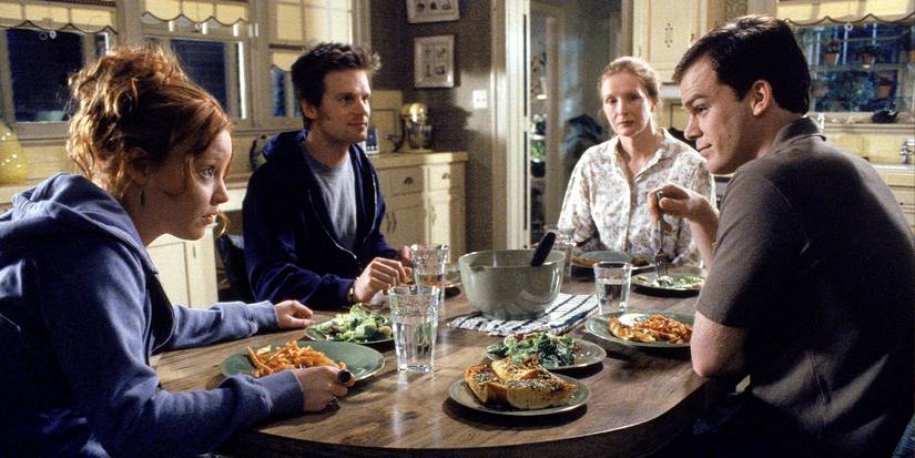 The cast of 'Six Feet Under' around a kitchen table.