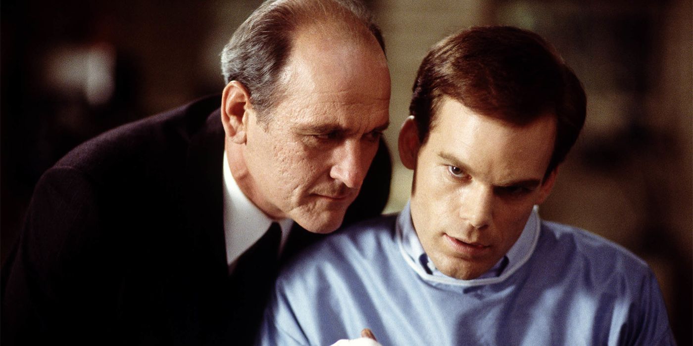 Nathaniel Sr. leans over David in Six Feet Under.