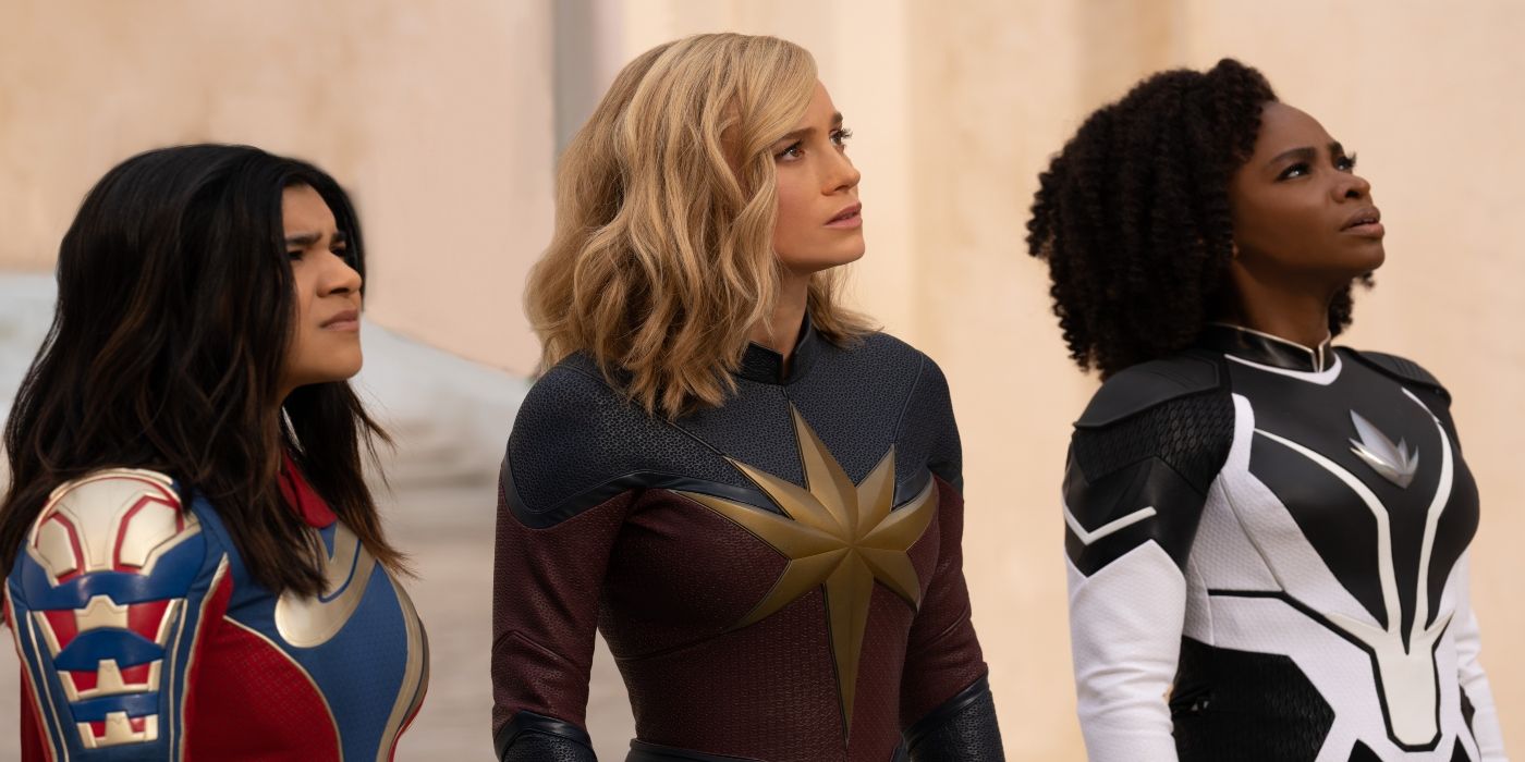 Ms. Marvel, Captain Marvel, and Monica Rambau looking in the same direction in the-marvels