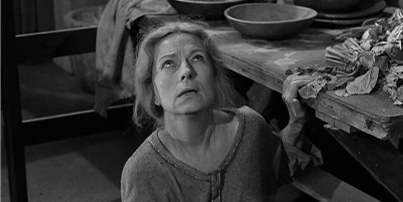 Agnes Moorehead sitting on the floor looking up in The Twilight Zone episode The Invaders.