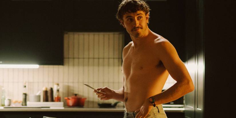Harry (Paul Mescal) shirtless in the kitchen in All of Us Strangers