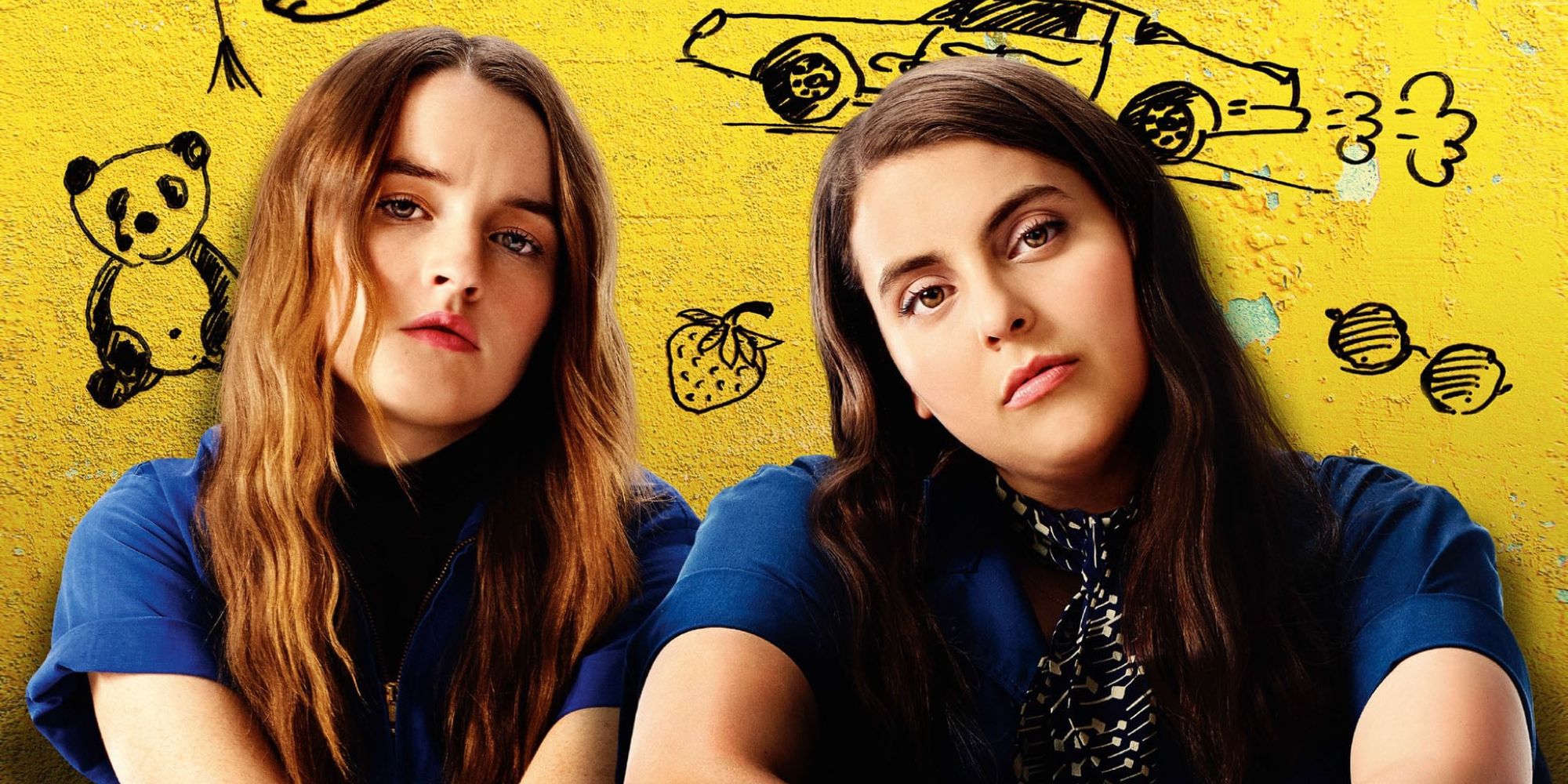 Kaitlyn Dever and Beanie Feldstein looking at the camera in a poster for Booksmart
