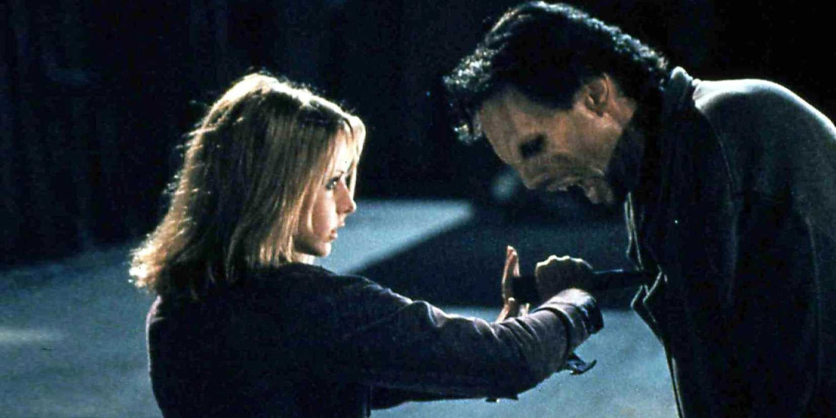 Buffy (Sarah Michelle Gellar) stabs a monster in 'Buffy the Vampire Slayer.' Buffy the Vampire Slayer - School Hard - 1997