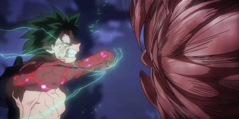 Heavily damaged Deku punching Muscular in My Hero Academia