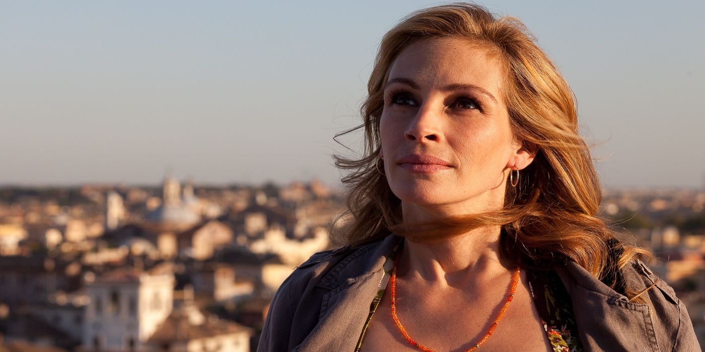 Julia Roberts in Eat, Pray, Love smiling and looking at the sky.