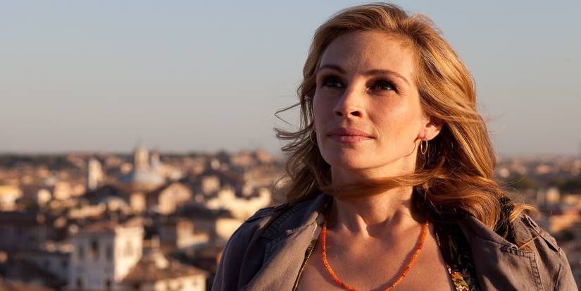 Julia Roberts in Eat, Pray, Love smiling and looking at the sky.